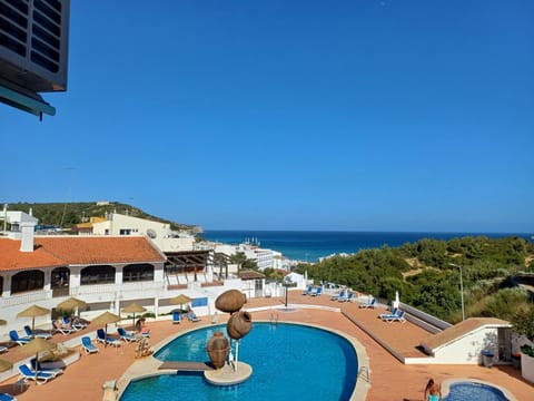 View (from property/room), Bedroom, Sea view, Swimming pool