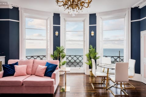 Bed, Decorative detail, Seating area, Beach, Sea view