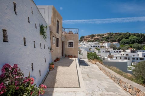 Property building, Nearby landmark, Day, Neighbourhood, Natural landscape, City view, Street view