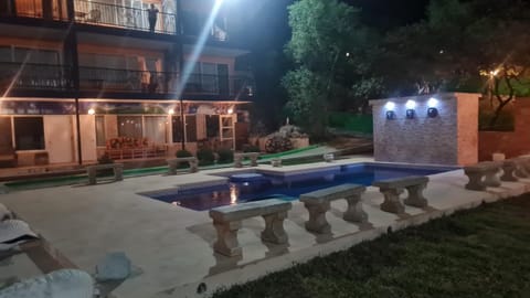 Property building, Night, Swimming pool