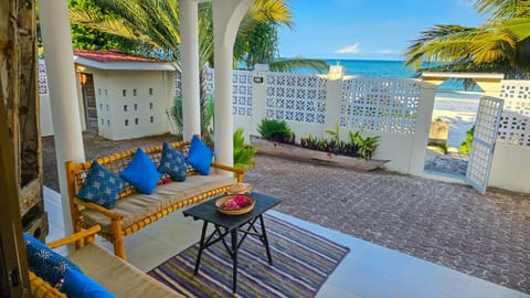 View (from property/room), Balcony/Terrace, Seating area, Beach, Sea view