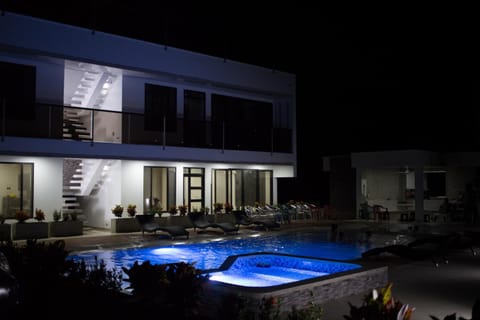 Property building, Night, Natural landscape, Pool view, Swimming pool