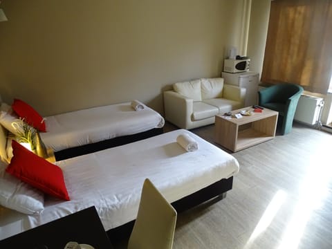 Bed, Living room, Seating area