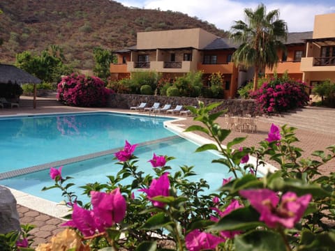 Property building, Garden, Pool view, Swimming pool