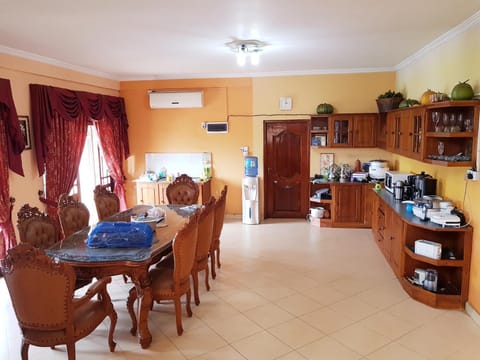 Kitchen or kitchenette, Dining area, fireplace, minibar, air conditioner