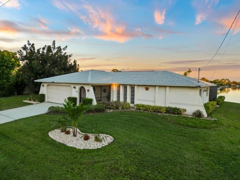 Serenity Waterfront Villa with King Suite, Private Pool, Great Lanai Enclosure and Long Water Views Villa in Cape Coral