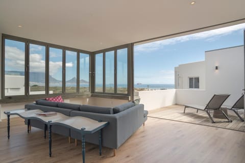 View (from property/room), Balcony/Terrace, Living room, Seating area, Mountain view, Sea view