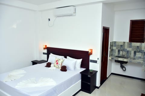 Bed, Photo of the whole room, Bedroom, towels, air conditioner