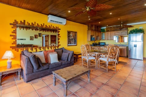Warm Interiors and Orange Hues on Ground Floor in Front of Beach Casa in Playa Flamingo