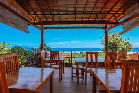 Restaurant/places to eat, Day, Natural landscape, View (from property/room), Balcony/Terrace, Living room, Food and drinks, Seating area, Dining area, Food, Sea view, Internal: Not applicable to any particular room