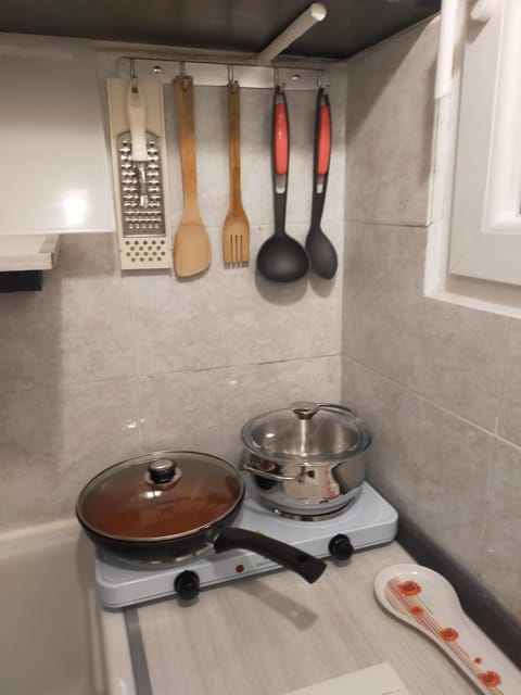 Kitchen or kitchenette, stove