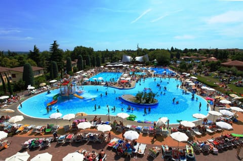 Happy Camp mobile homes in Camping Bella Italia Camping /
Complejo de autocaravanas in Peschiera del Garda