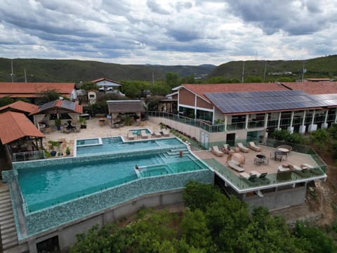 Property building, Natural landscape, Bird's eye view, Mountain view, Pool view, Swimming pool