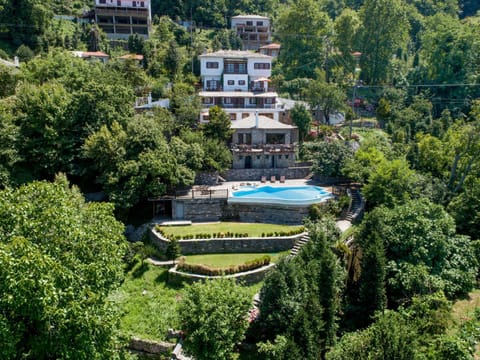 Property building, Spring, Day, Natural landscape, Bird's eye view, Swimming pool