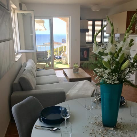 Living room, Seating area, Dining area, Sea view