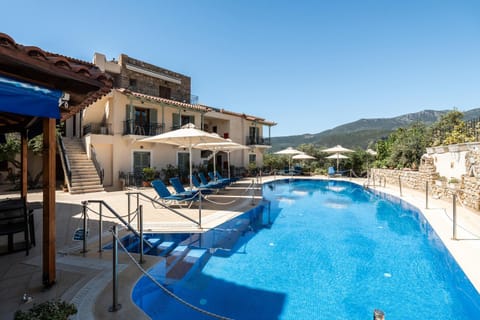 Property building, Patio, Natural landscape, Mountain view, Pool view, Swimming pool, sunbed