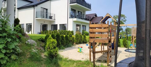 Property building, Neighbourhood, Natural landscape, Children play ground, Children play ground, Garden, Beach, Garden view, Garden view