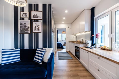 View (from property/room), Kitchen or kitchenette, Living room, Seating area, air conditioner