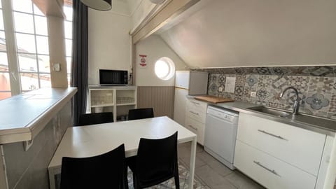 Dining area, dishwasher, microwave, kitchen