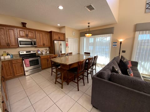 Kitchen or kitchenette, Seating area, Dining area, dishwasher, oven, stove, toaster