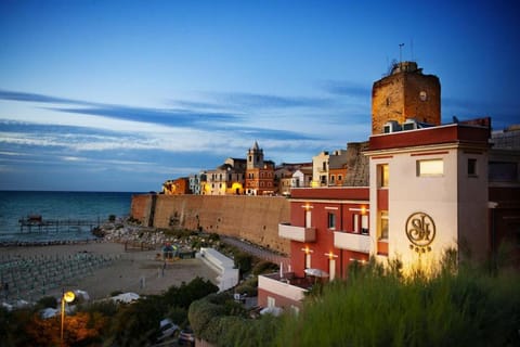 Property building, Nearby landmark, Beach, Landmark view, Sea view