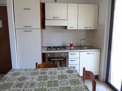 Kitchen or kitchenette, stove