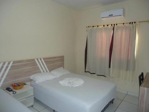 Bed, Photo of the whole room, Bedroom, towels, air conditioner