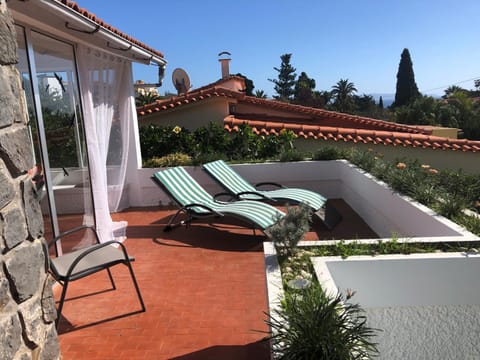 Casa Palmeira - Ferienhaus mit Meerblick House in Caniço