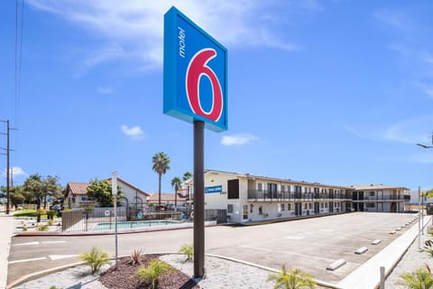 Property building, Property logo or sign, Swimming pool, Parking