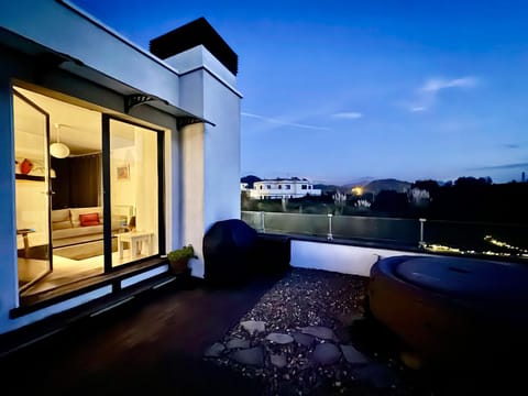 Property building, Patio, Night, View (from property/room), Balcony/Terrace, Living room, Seating area