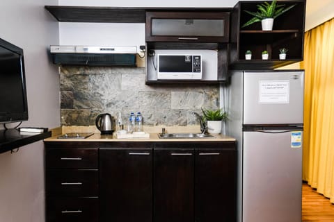 Kitchen or kitchenette, oven, stove