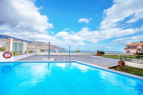 City view, Mountain view, Pool view, Sea view, Swimming pool