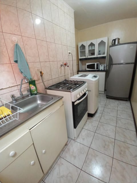 Kitchen or kitchenette, minibar, washing machine