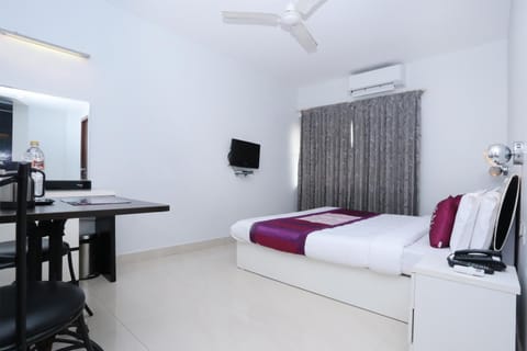 Super Collection O Malabar Illam Hotel in Kochi