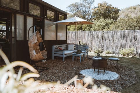 Property building, BBQ facilities, Seating area, Garden view