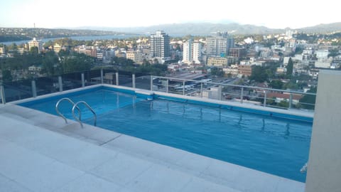 Property building, Day, Natural landscape, City view, Mountain view, Pool view, Swimming pool