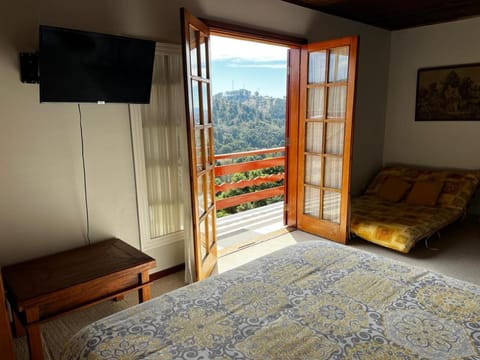 Bed, Natural landscape, TV and multimedia, View (from property/room), Balcony/Terrace, Bedroom, Mountain view