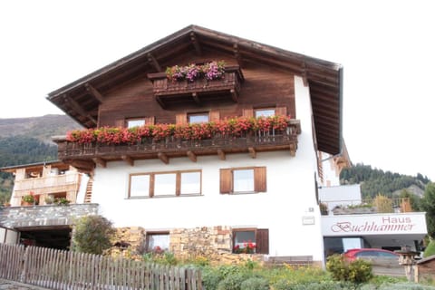 Property building, Staff, Facade/entrance, People, Property logo or sign, Horse-riding, Ski School, Skiing, Tennis court, Hiking, Cycling, Guests, Garden view, Mountain view, Sports, children, young children, older children, group of guests, Certificate/Award, Family