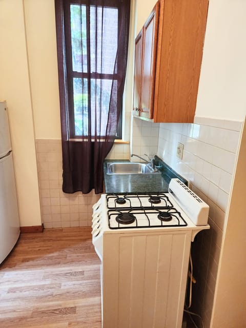 Kitchen or kitchenette, stove