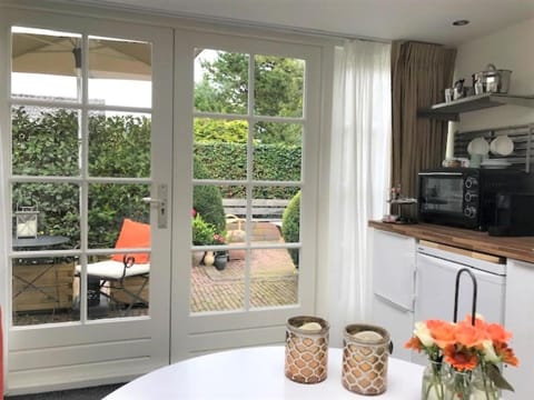 Kitchen or kitchenette, Dining area, Garden view