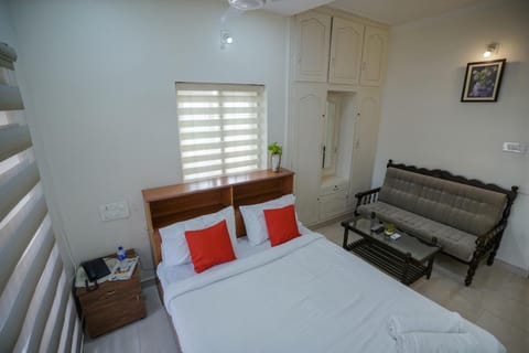 Bed, Seating area, Bedroom