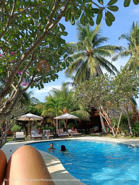 Lucy's Garden Hotel Campground/ 
RV Resort in Pemenang