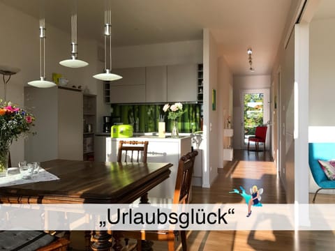 Kitchen or kitchenette, Seating area, Dining area, Text overlay