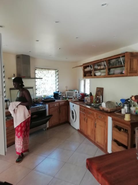 Kitchen or kitchenette, dishwasher, oven, stove, washing machine