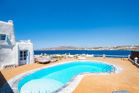 Property building, Patio, Pool view, Sea view, Swimming pool, sunbed