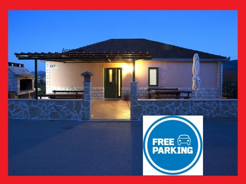 Property building, Facade/entrance, Night, Property logo or sign