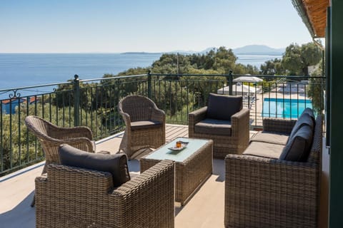 Patio, View (from property/room), Balcony/Terrace, Seating area, Mountain view, Sea view, Swimming pool, sunbed