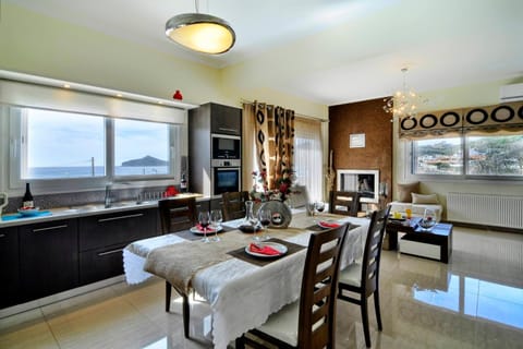 Kitchen or kitchenette, Living room, Dining area, Sea view