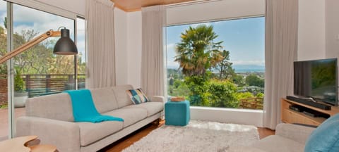 TV and multimedia, Living room, Seating area, City view, Sea view