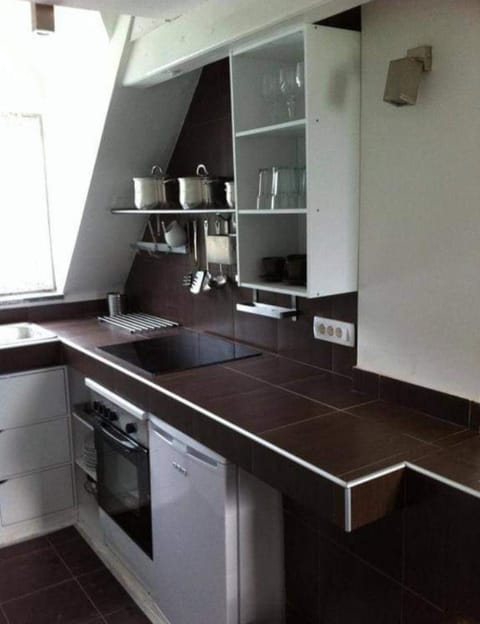 Kitchen or kitchenette, oven, stove